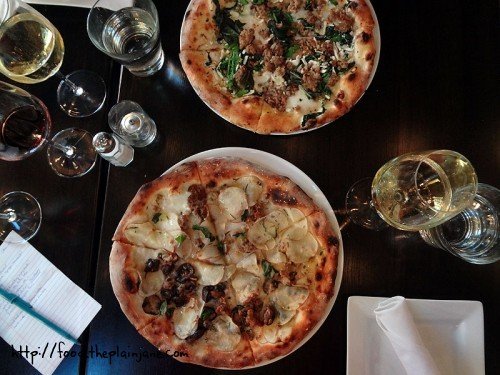 table-from-above-pizzas-isola