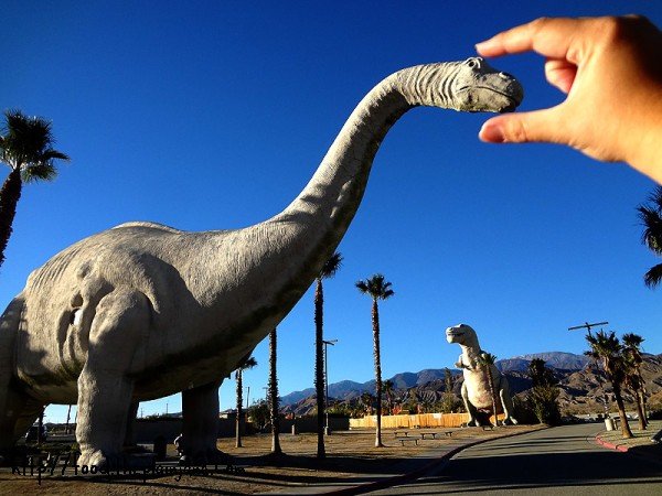 crushing-his-head-dino