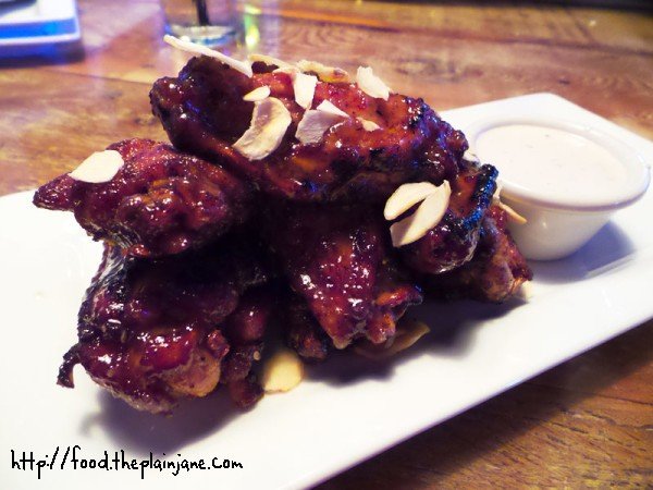 double cooked garlic honey chicken wings at southpaw social club - san diego, ca