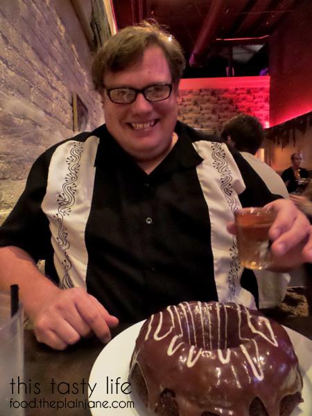 Jake with his cake and whiskey from Werewolf in San Diego, CA