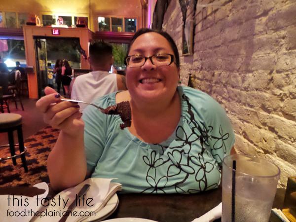 Mary has a bite of cake