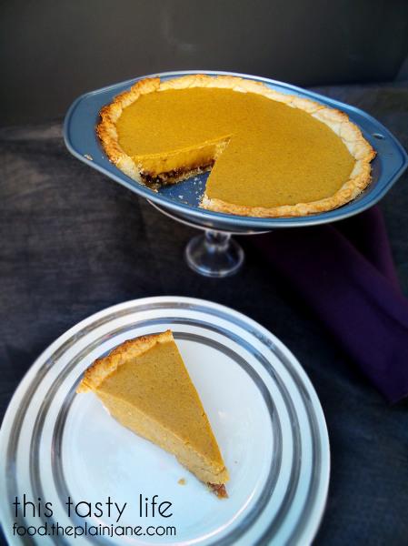 Slice of Pumpkin Pudding Pie with Pecan Crust | This Tasty Life - http://food.theplainjane.com