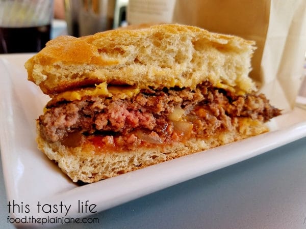 Cross view of the cheeseburger at Burger Lounge | Kensington - San Diego, CA