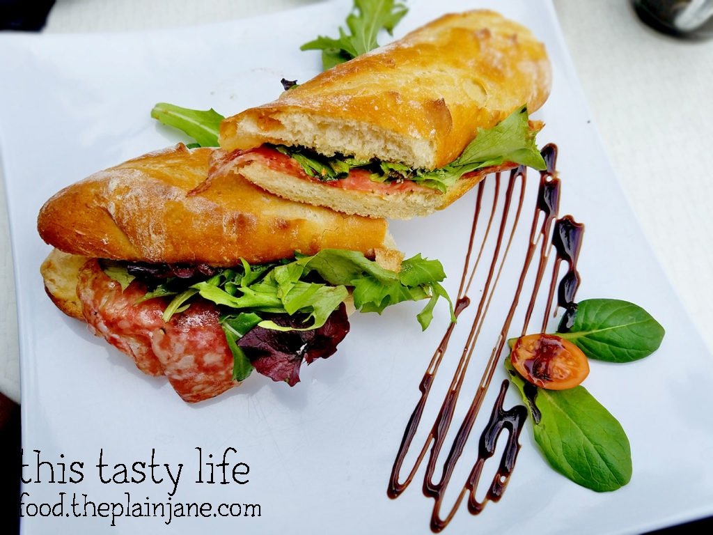 Corse Sandwich with Salami, Fig Chutney, and Gruyere Cheese at Le Parfait Paris | San Diego, CA