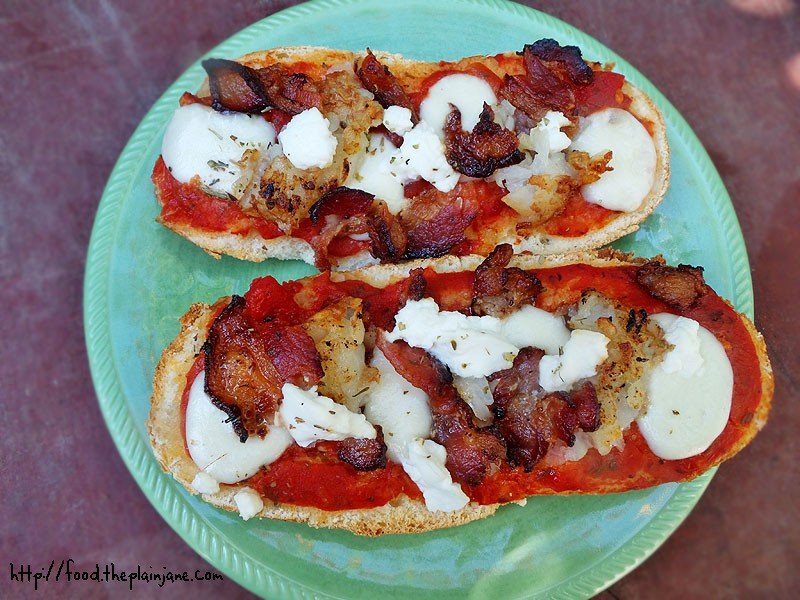 mini breakfast pizzas on pretzel rolls